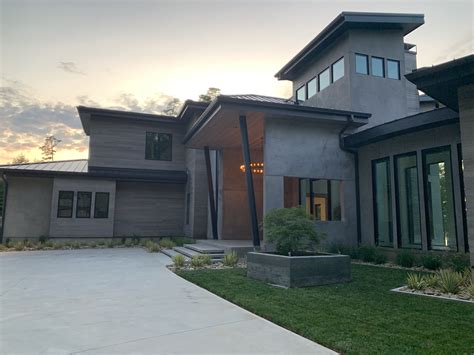 modern stucco house exterior with metal roof|stucco finishes exterior pictures.